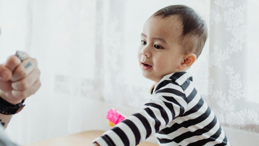 early signs in language delay vs autism; SoundEd Therapy for speech and language