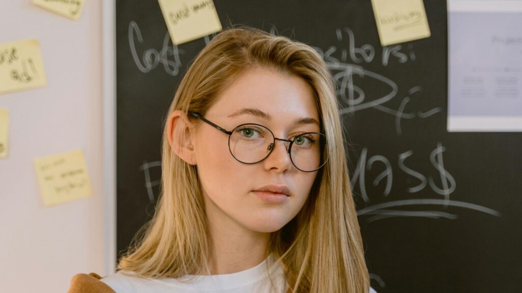 a student in school considering teletherapy; SoundEd teletherapy and teleservices for schools