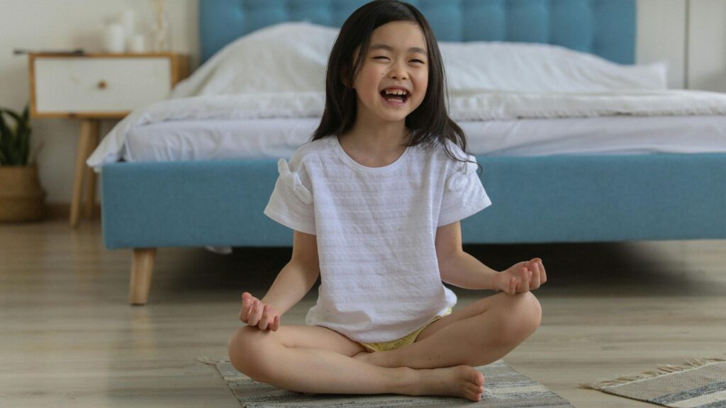 child smiling after online therapy; Sounded therapy online teletherapy services