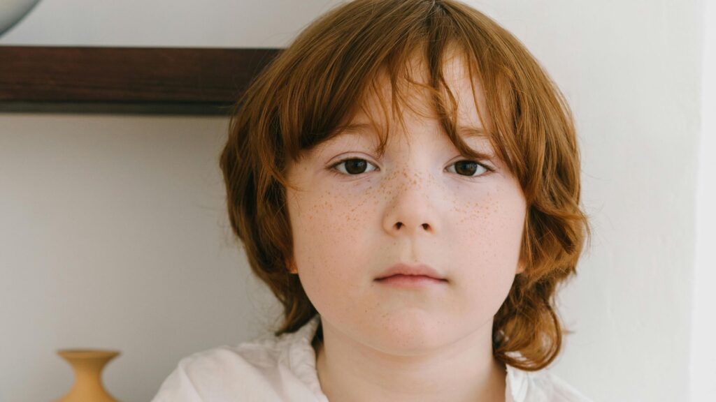 A student rlooking pensively depicting support in teletherapy; SoundEd therapy for IEP timelines