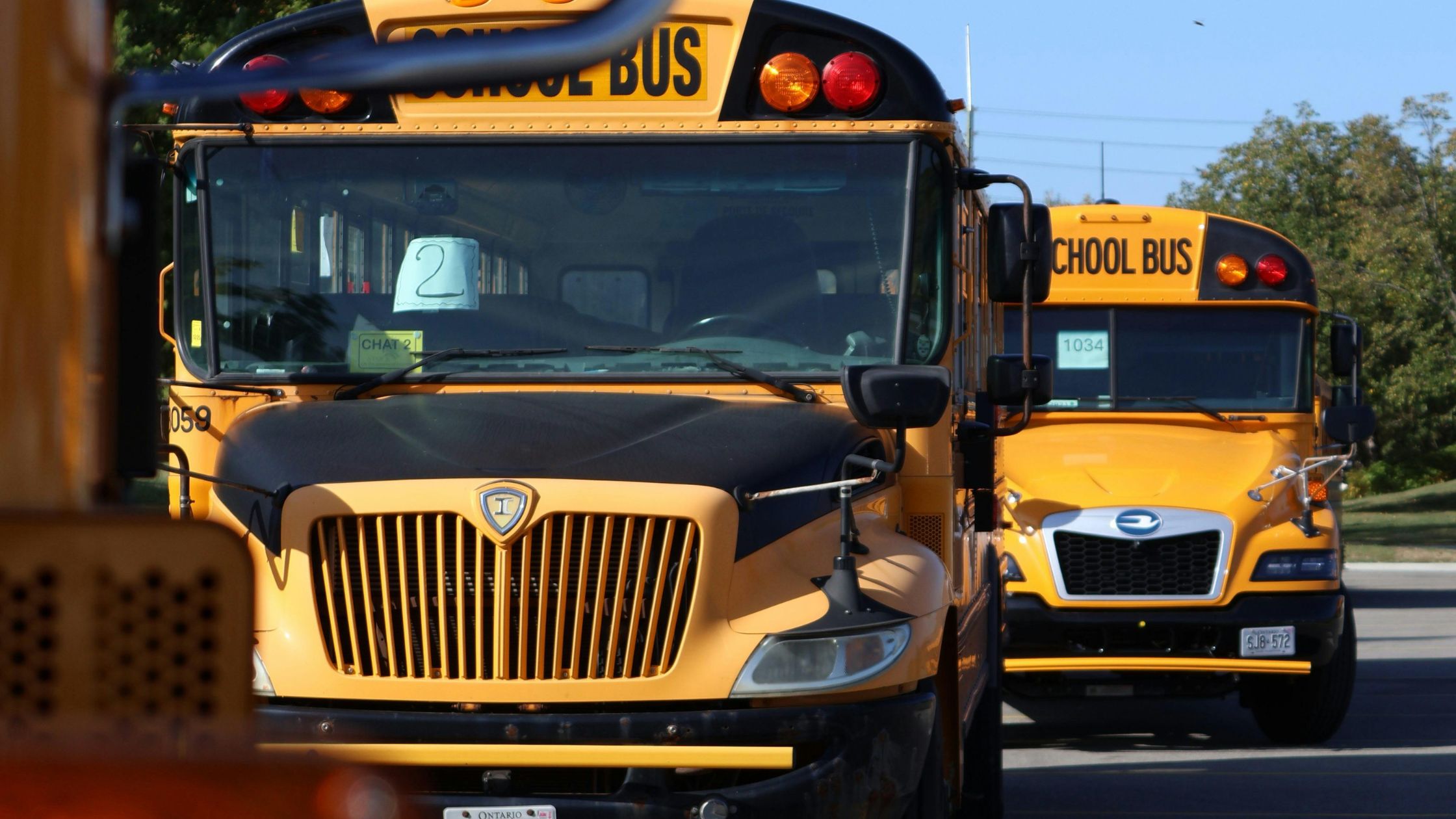 Empty yellow school buses depicting effects of staffing transitions; SoundEd therapy