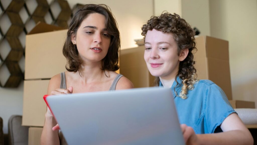 2 women discussing telehealth with in person care; SoundEd therapy telehealth services