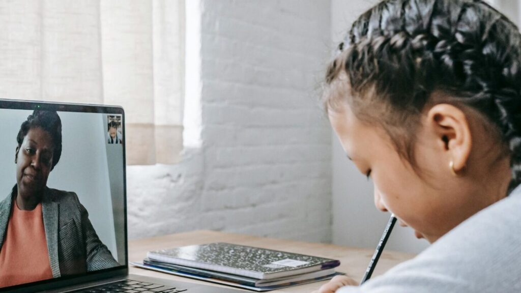 Teenager on a teletherapy call; SoundEd teletherapy for teens with autism