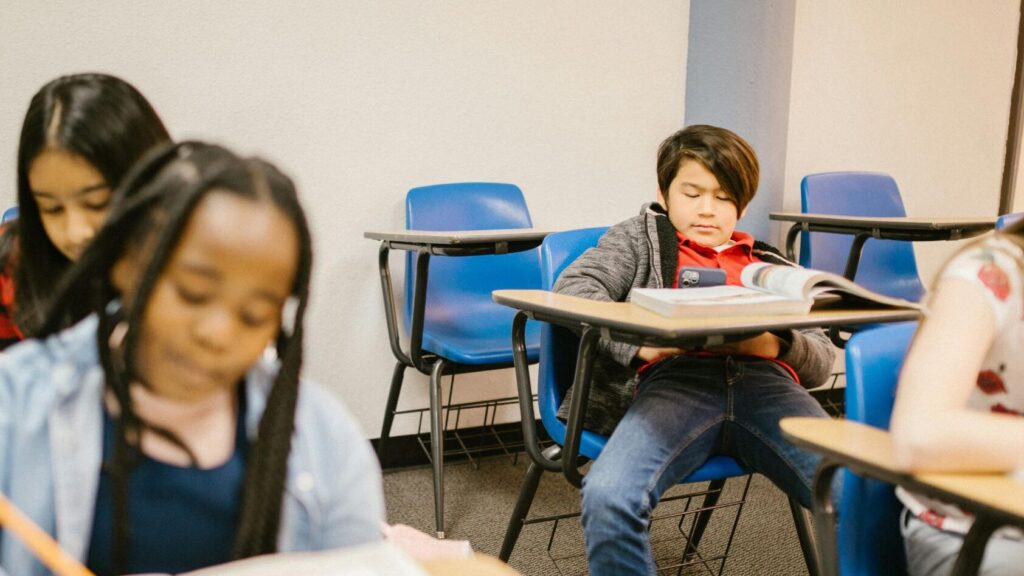 A child in a classroom; SoundEd therapy for learning evaluations